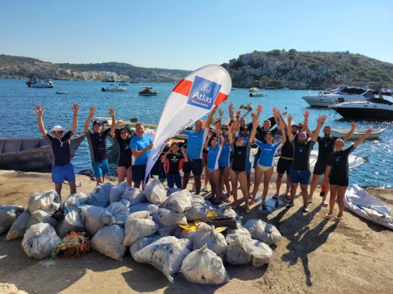 Atlas employees clean up plastic and rubbish from various coastal areas